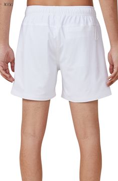 Soak up the sun or take a dip in these cool swim trunks crafted from easy-moving stretch fabric. Elastic/drawstring waist Mesh lined Side pockets; key loop pocket 92% polyester, 8% elastane Machine wash, line dry Imported White Swim Trunks With Built-in Shorts, White Swim Trunks With Upf 50+ For Beach, Athleisure Swim Trunks With Pockets For Beach, Short Length Swim Trunks With Drawstring For Vacation, White Swim Trunks Upf 50+ For Beach, White Upf 50+ Swim Trunks For Beach, White Swim Trunks With Upf 50+ For Summer, Casual White Swimwear With Upf 50+, White Swim Trunks With Pockets For Sports