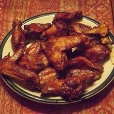 chicken wings on a plate ready to be eaten