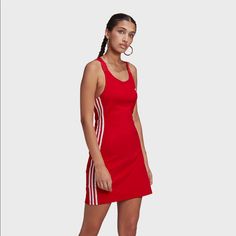 Keep Your Athleisure Looks Fun And Bold In The Adidas Red Racerback Dress. This Dress Features A Rich Red Colorway Throughout, Complemented By 3-Stripe Detailing Up The Sides, And Paired With An Embroidered Trefoil Logo On The Left Chest In White For Striking Branding And A Splash Of Contrast. Product Details: Red Racerback Dress From Adidas. All-Red Colorway. 3-Stripe Logos Down The Sides. Racerback-Style Straps. 95% Cotton, 5% Spandex. Machine Wash Cold Inside Out, Lay Flat To Dry. Imported. Size & Fit: Bodycon Fit. Item Pictured Is A Size Small. 25" (63.5cm) Length At Side Seams. Measurements May Vary By Size. Model Measurements: Height: 5'9" (175 Cm) Bust: 32 (81 Cm) Waist: 24" (61 Cm) Athleisure Looks, Adidas Dress, Corduroy Overall Dress, Athleisure Dress, London Dress, Athletic Dress, Athleisure Women, Textured Dress, Racerback Dress