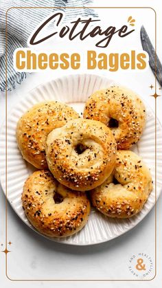 bagels on a paper plate with poppy seed sprinkles in the middle