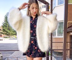 White mohair cardigan  Color on the photo : offWHITE ✔️25%wool ✔️24% kid mohair ✔️51% acrylic  Weight 0,65 kg/1,4 lb. Dimensions for S size: Length - 56 cm/22 inch. Width  - 64 cm/25 inch. Sleeves length - 66 cm/26 inch. Sleeves width - 22 cm/8.5 inch. Model wears M size Model measurements: Height - 1.7 cm/ 5.7 ft. Bust - 87 cm/ 43 inch. Waist - 63 cm/ 24 inch Hips - 90 cm/ 35 inch. This yarn is super soft, tender, warm and comfortable  HANDMADE This is a women's white mohair cardigan. White knit cardigan great part of your outfit. This white cardigan os the best design in this color. Mohair knit cardigan is a beautiful cloth in your wardrobe especially this is an arm knit jamper Soft knit cardigan, oversized cardigan is the best women warm cardigan and women jamper.  Mohair cloth always a Wide Sleeve Sweater, Pull Mohair, Soft Sweaters, Soft Knit Cardigan, White Knit Cardigan, Anja Rubik, Mohair Knit, Cardigan White, Mohair Yarn