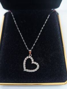 "14K 585 Diamond Heart and 14k 585 Chain Pendant Necklace. Diamond Heart Pendant Necklace 14k White Gold.Holiday Jewelry Gift Diamond 14k 585 Here is a gorgeous sparkling 14K 585 Diamond Heart and 14k 585 Chain Pendant Necklace Diamonds are exceptionally white high clarity and color! Both pendant and chain are marked 585, European for 14k (both are white gold) Pendant measure: .75 inches length  Chain: 15.5 inches long Don't miss out a lovely holiday gift! WOW *If you have have any questions reg White Gold Hallmarked Heart Necklace For Valentine's Day, Double Heart Diamond Necklace For Valentine's Day Gift, Valentine's Day Gift Diamond Pendant Necklace, Valentine's Day Diamond Cut Jewelry, Brilliant Cut Necklace For Valentine's Day Gift, Anniversary Necklaces With 17 Jewels For Valentine's Day, Valentine's Day Anniversary Gift Hallmarked Necklace, Mother's Day Diamond Cut Open Heart Necklace, Valentine's Day Gift Heart Cut Diamond Necklace