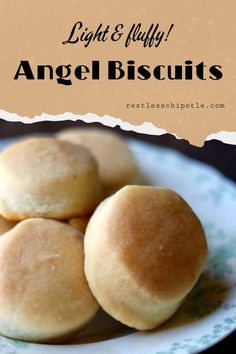 three rolls on a plate with the words light and fluffy angel biscuits above it