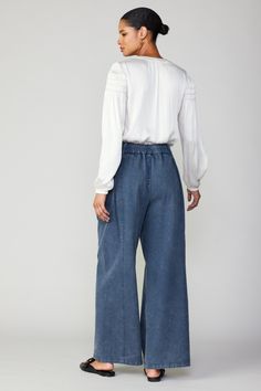 These wide-leg pants bring a sense of easy sophistication to any outfit. Made from indigo denim that's been washed down for a vintage look, the pair has a pleated waist and paneling styling. There's elastic built into the waistband at the back, so you can wear them comfortably all day long. •Zip fly with double-button closures •Pleated front •Slant front pockets •Partially elasticized waistband DIMENSIONS •Standard: 30" L of inseam Item Number 2370246 100% cotton Indigo Denim, Vintage Indigo, Collar Sweater, Wide Pants, Vintage Denim, Vintage Look, Item Number, Denim Pants, Passion For Fashion