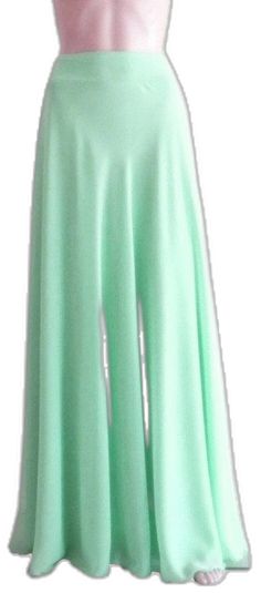 Elegant Green Flowy Skirt, Elegant Flowy Green Skirt, Green Full-length Flowy Skirt, Green Flowy Full-length Skirt, Elegant Green Stretch Maxi Skirt, Elegant Green Asymmetrical Maxi Skirt, Flowy Green Flared Skirt, Green Asymmetrical Lined Maxi Skirt, Green Flowy Flared Maxi Skirt