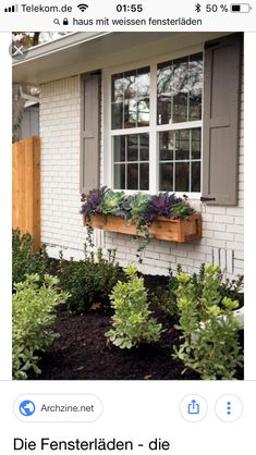 an image of a window box with plants in it