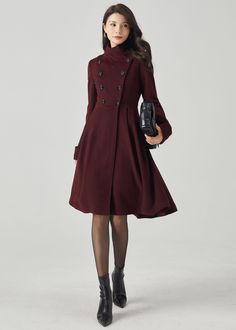 "FEATURES 50% wool, 50% wool blend Fully liner with polyester Two side pocket Stand-up collar Long sleeve,Turn-back cuffs with button detail Double breasted button front asymmetrical hemline For Winter, Autumn dry clean You can check the style in other colors from below link. https://bit.ly/3PCSIlK ★★Mode size Height 170cm (5′ 7″)  Bust 84 cm (33\")  Waist 66 cm (26\")  She wears size XS. ★★Bespoke Order Service If you Request other color Request the length Your height is not between 155 cm- 175 Chic A-line Wool Coat For Work, Solid Knee-length Winter Outerwear, Formal A-line Wool Coat For Fall, Elegant Knee-length Outerwear In Solid Color, Knee-length Winter Workwear Outerwear, Knee-length Winter Outerwear For Work, Knee-length Single Breasted Winter Outerwear, Elegant Knee-length Winter Outerwear, Formal Wool Coat With Stand Collar For Fall