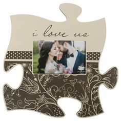 a puzzle piece with the words i love u on it and an image of a couple kissing