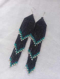 Black Beaded Earrings Evening Earrings Long Turquoise Ombre Earrings Beaded Earrings Black Chandelier Earrings Beaded Hanging Fringe Earrings Earrings are 14 cm (5.51 inches) long with hooks and 2.5 cm (0.98 inches) wide., 100% handmade. You can find my other products in my store: https://www.etsy.com/shop/SilankaUa?ref=seller-platform-mcnav Please note that due to lighting effects, brightness, contrast and other monitor settings, there may be slight differences in the color tone/hue of the photo on the website and the actual product. STORE POLICY 1. If the package is damaged or your post office tries to deliver you an empty package, refuse to receive it or file a claim, otherwise it cannot be proven. 2. International customers are responsible for any import fees, taxes and duties associat Black Beads Dangle Earrings For Festival, Black Bead Dangle Earrings For Festivals, Black Beaded Dangle Earrings For Festivals, Gift Turquoise Beaded Chandelier Earrings, Turquoise Beaded Chandelier Earrings As Gift, Turquoise Beaded Chandelier Earrings For Gift, Turquoise Beaded Earrings With Black Beads As Gift, Turquoise Earrings With Black Round Beads, Turquoise Beaded Chandelier Earrings With Round Beads