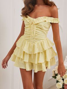 Features: This Marilyn Yellow Floral Print Mini Dress features a sexy lacing up detail and a bold floral print. This off-the-shoulder design features 3 layers of wood ears ruffles and a hemmed cake mini robe. This unique design will be the perfect clothing choice for your next holiday.