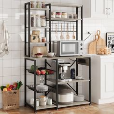 a kitchen area with a microwave and various food items on shelving units in it