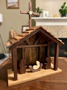 a wooden nativity scene with the birth of jesus