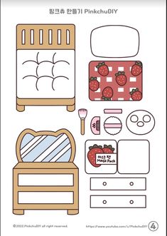 the paper doll is set up to make it look like a bed and dresser with strawberrys on it