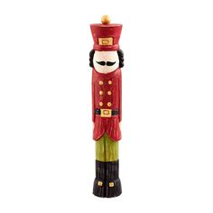 Unveil the enchantment of Christmas with our Red Wood Nutcracker Sitter. Crafted from paulownia wood, this hand-painted masterpiece showcases festive red and green colors, standing at 3" x 14" with a distressed finish and charming unique markings. Embrace the holiday spirit with this perfect mantel and tabletop decor. | Mud Pie Red Wood Nutcracker Sitter | Pine Wood Pie For Christmas, Wood Nutcracker, Willow Tree Wedding, Christmas Pie, Turkey Decor, Christopher Radko Ornaments, Paulownia Wood, Candle Room, Red Wood