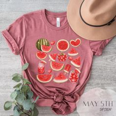 "Cute Watermelon Tee, 7 Colors, Summer Shirts for Women, Watermelon Aesthetic Shirts, Cute Summer Shirts, Fun Summer Shirt, Beach Summer Shirt, Cute Shirts For Women, Shirts for Women Trendy, Trendy Summer Shirts, Summer Tees, Summer Tshirts, Tropical Summer Shirts, Fruit Shirt, Foodie Shirts, Fruit Lover Shirt, Summer Vibes Shirts, Fourth of July Tees, Super Fun Summer Shirts, Gift For Mom, Gift For Her, Pink Shirt, Shirts for Girls.  *Our shirts are made to order especially for you. Because of this reason, we don't accept returns or exchanges. Unless there's defects. Please check your color and size chart before you place your order.  How to Order: 1.Select the shirt and color size  2.Select the quantity 3.Click \" add to cart \" 4.Complete check out *Our Uni-Sex T shirts are High Qualit Pink Fruit Print Tops For Summer, Red Fruit Print Tops For Summer, Pink Strawberry Print Shirt For Summer, Pink Strawberry Print Summer Shirt, Summer Pink Shirt With Strawberry Print, Red Strawberry Print Top For Summer, Cute Summer Shirt With Strawberry Print, Cute Summer Tops With Fruit Design, Cute Fruit Design Tops For Summer