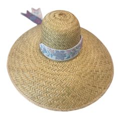 The extra-wide brim sun hat is woven, like a basket, with dried palm tree leaves. Then it is shaped with the same hat mold we use to shape our Daisy sun hat. This super wide-brimmed hat will glamorously shield you from the sun! Crown Circumference: 23.5 inches (when measured on the outside of the hat). There is an interior elastic band with a circumference that is about 22 inches, with slight variability due to the fact that these are handmade. Brim Length: 7 inches (18 cm) Crown Height: 4 3/4 i Sun Crown, Palm Tree Leaves, Crown Heights, Brimmed Hat, Floral Hat, Wide Brim Sun Hat, Floral Ribbon, Floral Tapestry, Tree Leaves