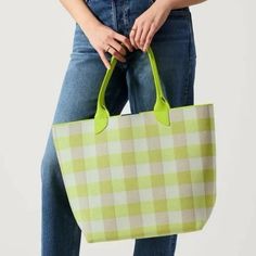 Brand New With Tags Rothy’s Lightweight Tote Color: Citrus Gingham Condition: Brand New With Tags Retail: $169 Availability: Sold Out | Hard To Find Color Details & Dimensions Lightweight, Flexible Design In A Plaid Eggshell Checkered And Neon Yellow Pattern. Durable Top Handles In Neon Yellow Fit Comfortably Over The Shoulder. Fits Everything From Your Picnic Mat To Your Yoga Clothesand Even An Extra Pair Of Shoes. A Handy Key Leash In White Keeps Your Keys Or Accessories Secure And Easy To Fin Navy Blue Bag, Juicy Couture Handbags, Yellow Fits, Picnic Mat, White Handbag, Cheap Handbags, Find Color, Yellow Pattern, Trending Handbag