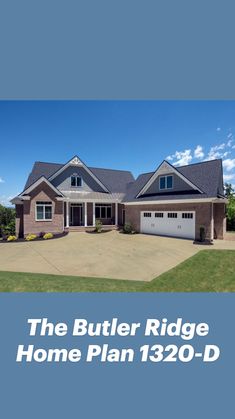 a large brick house with two garages