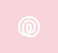 a pink background with the letter q in white