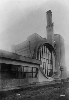 an old black and white photo of a building