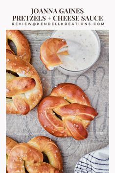 pretzels and cheese sauce on a wooden table with the title text overlay reads, jona ganes pretzels and cheese sauce