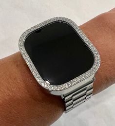 Ultra Apple Watch Band 49mm Silver Rolex Style and or Swarovski Crystal Bezel Cover Smartwatch Bumper Bling #AppleWatchCase #AppleWatch #UltraAppleWatch #AppleWatchCover #BlingAppleWatch #49mmAppleWatch #AppleWatchStraps #DiamondAppleWatch #SwarovskiCrystals #AppleWatchBand Modern Rectangular Stainless Steel Apple Watch Band, Modern Silver Apple Watch Band, Modern Silver Rectangular Apple Watch Band, Luxury Silver Apple Watch Band, Crystal Apple, Apple Watch Face, Apple Watch Sizes, Ultra Series, Bracelet Apple Watch