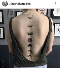 the back of a woman's neck with tattoos on her chest and behind it is an image of five moon phases