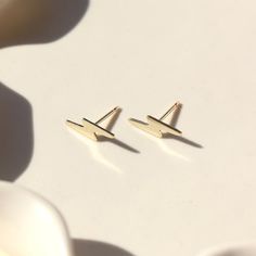 small 14k gold fill lightning bolt stud earrings, on a sunlit ceramic dish Double Piercing, Minimal Look, Forever Jewelry, Solid Gold Jewelry, Silver Spring, Lightning Bolt, Pendant Bracelet, Free Jewelry, Charm Jewelry