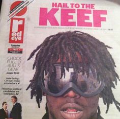 a man with dreadlocks and goggles on the cover of a news paper