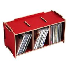 a red storage unit with cd's in it