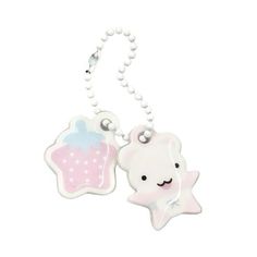 a white and pink keychain with a bear on it