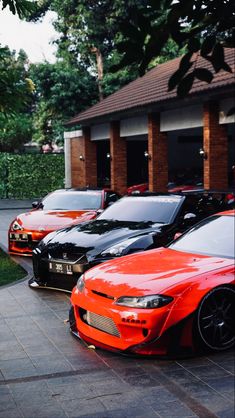 several cars parked in front of a building