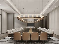 an empty conference room with long tables and chairs