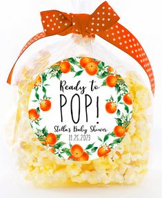 an orange themed candy bag with the words reads ready to pop on it and sits in front of a white background