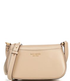 From kate spade new york&#x2C; the Bleecker Small Crossbody Bag features: Materials: 100% Cow leatherLining: FailleHardware: goldInterior: Zip PocketExterior: Slip PocketZip Top ClosureDimensions approx. (height x width x depth) (in): 13.5 x 9.6 x 2.8Strap drop length approx. (in): 22Saffiano Leather Imported. Luxury Beige Kate Spade Shoulder Bag, So Kate, Perfect Handbag, Small Crossbody Bag, Small Crossbody, Dillard's, Kate Spade New York, Cow Leather, Cross Body Handbags