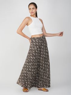 Crafted from breathable cotton fabric, our Luna wrap-around skirt features an A-line fit and flare, allowing you to spend your day care-free and in style. You can tie it around your waist — loose or tight, as per your choice. Its hemline ends just below your ankles and the excellent craftsmanship makes it a perfect choice to rock on casual occasions. Be it day or night, this free-size batik print skirt is incredibly comfortable and can be styled with t-shirts, crop tops, and so much more. Batik Bohemian Floral Print Flowy Wrap Skirt, Hippie Wrap Skirt With Lined Detail, Spring Linen Wrap Skirt, Asymmetrical, It Day, Shirts Crop, Blue Lily, Batik Print, Wrap Around Skirt, Batik Prints