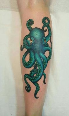 an octopus tattoo on the leg