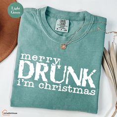 Comfort Colors® Funny Christmas Shirt Merry Drunk I'm Christmas Shirt, Christmas Drinking Shirt, Holiday Shirt, Funny Christmas Gift -Sizing and Color Guidelines- We use Comfort Colors Heavyweight brands t-shirts for all the listings where you see Comfort Colors in the title. The shirts are Unisex size. They are meant to be loose-fitting, so ordering one size smaller is recommended if you want a tighter fit. Each of our shirts is meticulously crafted to your specifications, making returns or exchanges impractical. Prior to placing your order, please consult our comprehensive color and size charts to ensure a flawless fit. Should you require assistance with sizing or color selections, feel free to reach out to us for clarification -HOW TO ORDER MULTIPLES- 1-) Simply select your preferred si Funny Christmas T Shirts, Christmas Drinking, Funny Christmas Gifts, Funny Christmas Shirts, Drinking Shirts, Holiday Shirt, Holiday Shirts, Size Charts, Funny Christmas