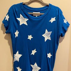 Blue And White Current/Elliot Star Shirt. Size 1- Fits Small/Medium. Never Worn. Blue Star Print Summer Tops, Blue Star Print Tops For Summer, Blue Cotton Star Print Tops, Blue Short Sleeve Top With Star Print, Blue Short Sleeve Tops With Star Print, Blue Star Print Top With Relaxed Fit, Star Shirt, Shirt Color, Colorful Shirts