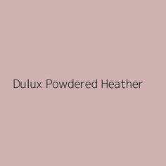 the words dulux powdered leather on a pink background