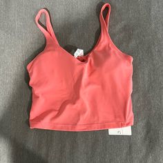 Has Never Been Worn And New With Tags. Open To Offers Else It Is Going To Plato’s Closet :) Sporty Bra-friendly Tops For Vacation, Sporty Bra Friendly Tops For Vacation, Athleisure Tops With Built-in Bra For The Beach, Casual Summer Crop Top For Light Exercise, Athleisure Tops With Built-in Bra For Vacation, Casual Beach Activewear With Built-in Bra, Casual Seamless Activewear For Beach, Sporty Seamless Top For Vacation, Athleisure Tank Top For Vacation