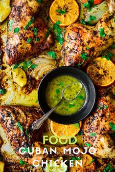 a pan filled with chicken, oranges and broccoli on top of a table