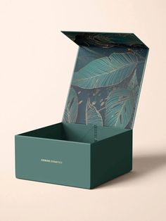 an open box with a plant print on it