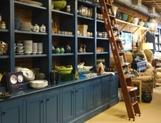 a ladder leaning up against a wall in a store