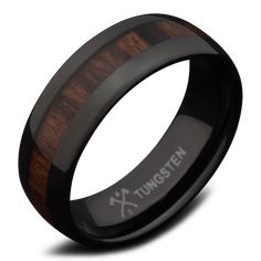 black ceramic ring with wooden inlays and the words tunstenn engraved on it