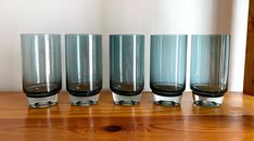 Nanny Still Paraati Tumbler Glasses 5 pcs Very Rare Vintage Design Glass by Riihimäen Lasi Finland Designer: Nanny Still (1926 - 2009). Manufacturer: Riihimäen Lasi Oy - glass factory. Size appox: Height: 13,5 cm / 5,3 inch, Diameter: 7 cm / 2,7 inch.   Description: This listing includes 5 tumbler highball glasses. These beautiful blue hue glasses belong to the Paraati Design Glass series by the famous Finnis designed Nanny Still.  Nanny Still McKinney was a Finnish, internationally acclaimed an Picardie Glasses, Die Nanny, Tumbler Glasses, Verre Design, Highball Glasses, Glass Artists, Nanny, Design Vintage, Very Rare