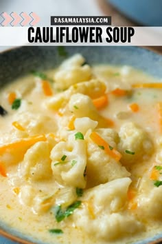 cauliflower soup with carrots and parsley in a blue bowl