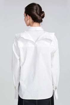 This regular-fit long sleeve shirt is crafted from breathable fabric and offers classic detailing with a twist. It includes a front button closure, a collar, and detailed shoulders for a touch of elegance. The perfect classic yet modern look.Fabric: Cotton, Polyester White Long Sleeve Blouse With Hidden Button Closure, Cotton Tops With Lapel Collar For Office, White Lapel Collar Tops For Work, Modern Tops With Fold Down Collar And Placket, Long Sleeve Tops With Placket For Office, Modern Tops With Placket And Fold Down Collar, Modern Fall Tops With Placket, Office Shirt With Fold Down Collar, White Shirt With Hidden Button Closure For Spring