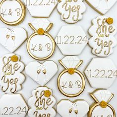 wedding cookies decorated with gold and white icing