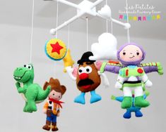 toy story mobiles hanging from the ceiling